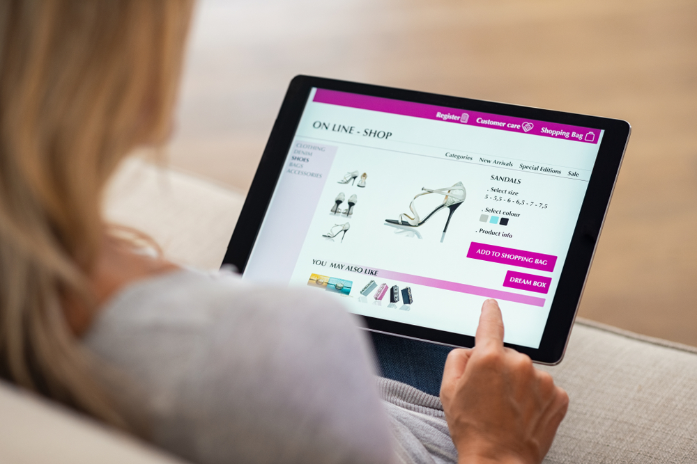 ecommerce website with woman shopping for shoes